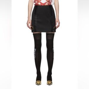 Versace black mini skirt with side gold buckles